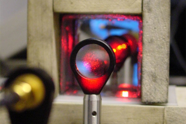 a tube with a laser pointing at it